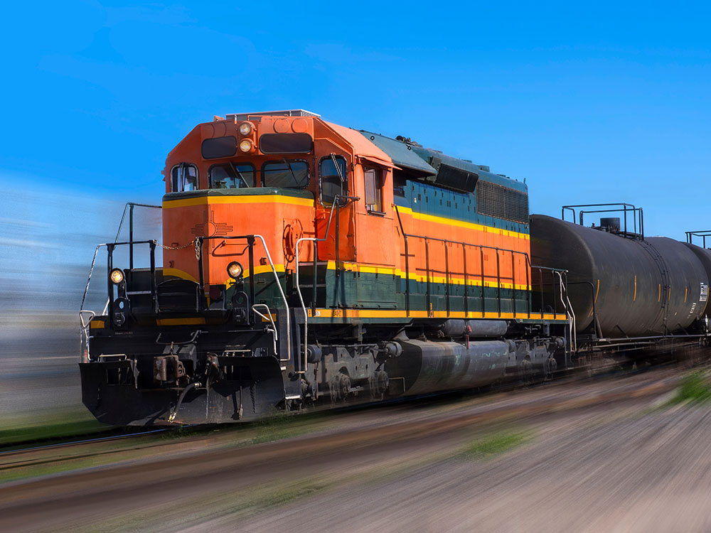 Orange train moves with speed