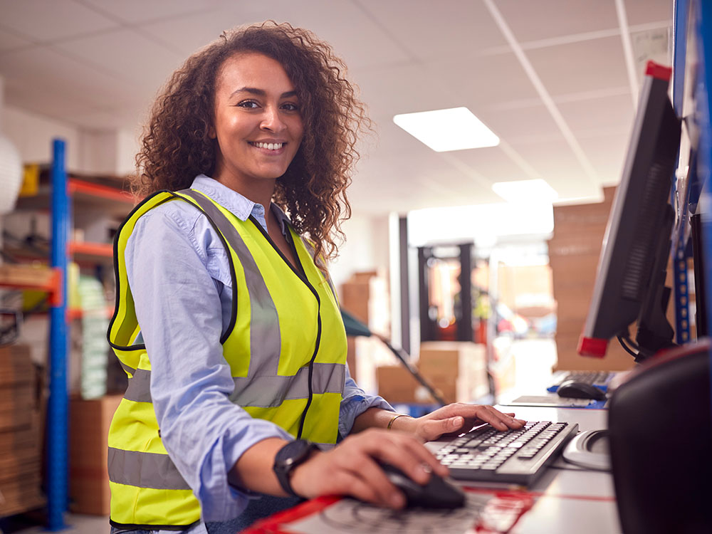 woman smiling in warehouse for snap on case study