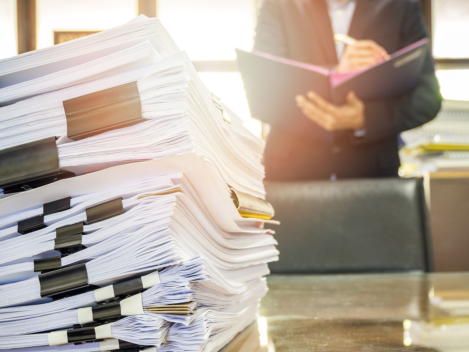 pile of legal papers prepared for document scanning software
